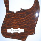 Quilted maple bass pickguard